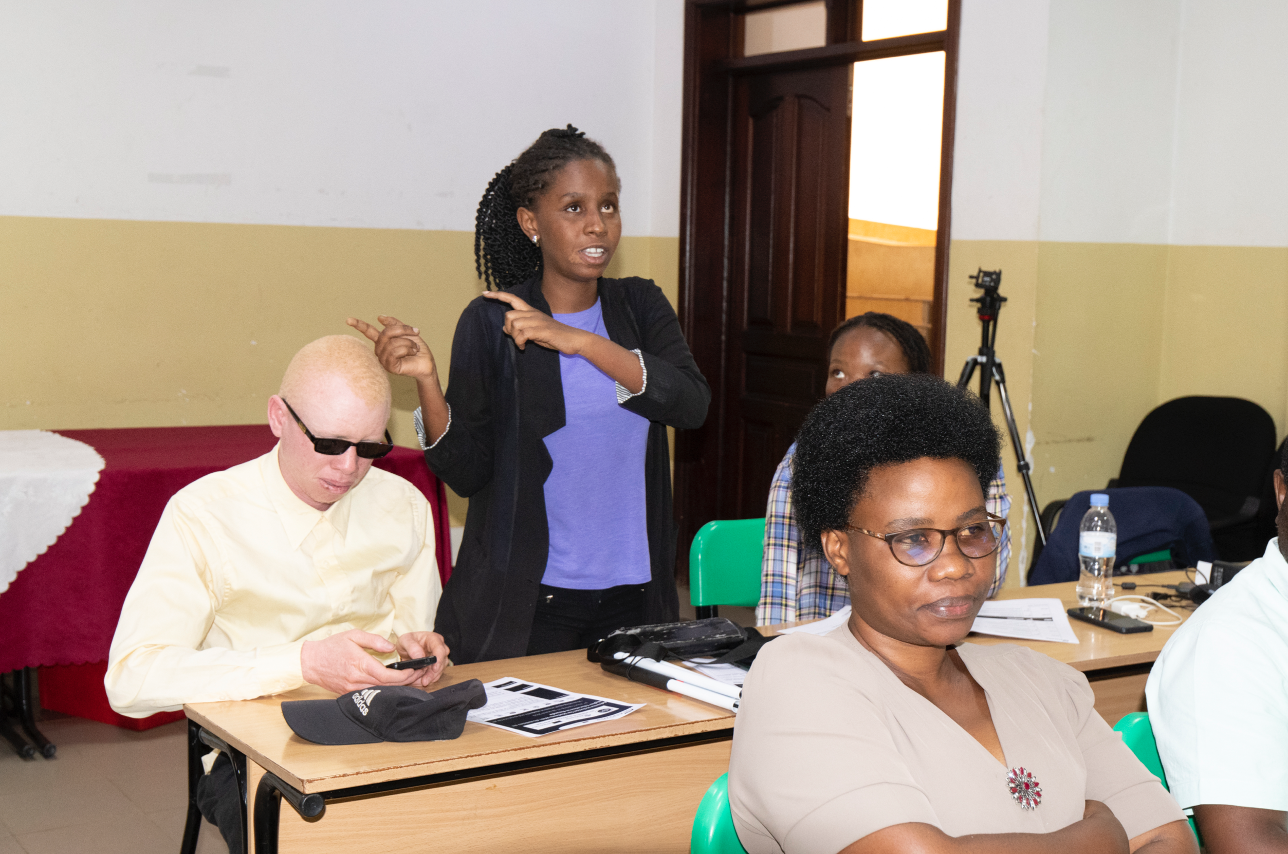 A student with disability addresses the meeting, highlighting key challenges hindering full inclusion in higher education calling for change