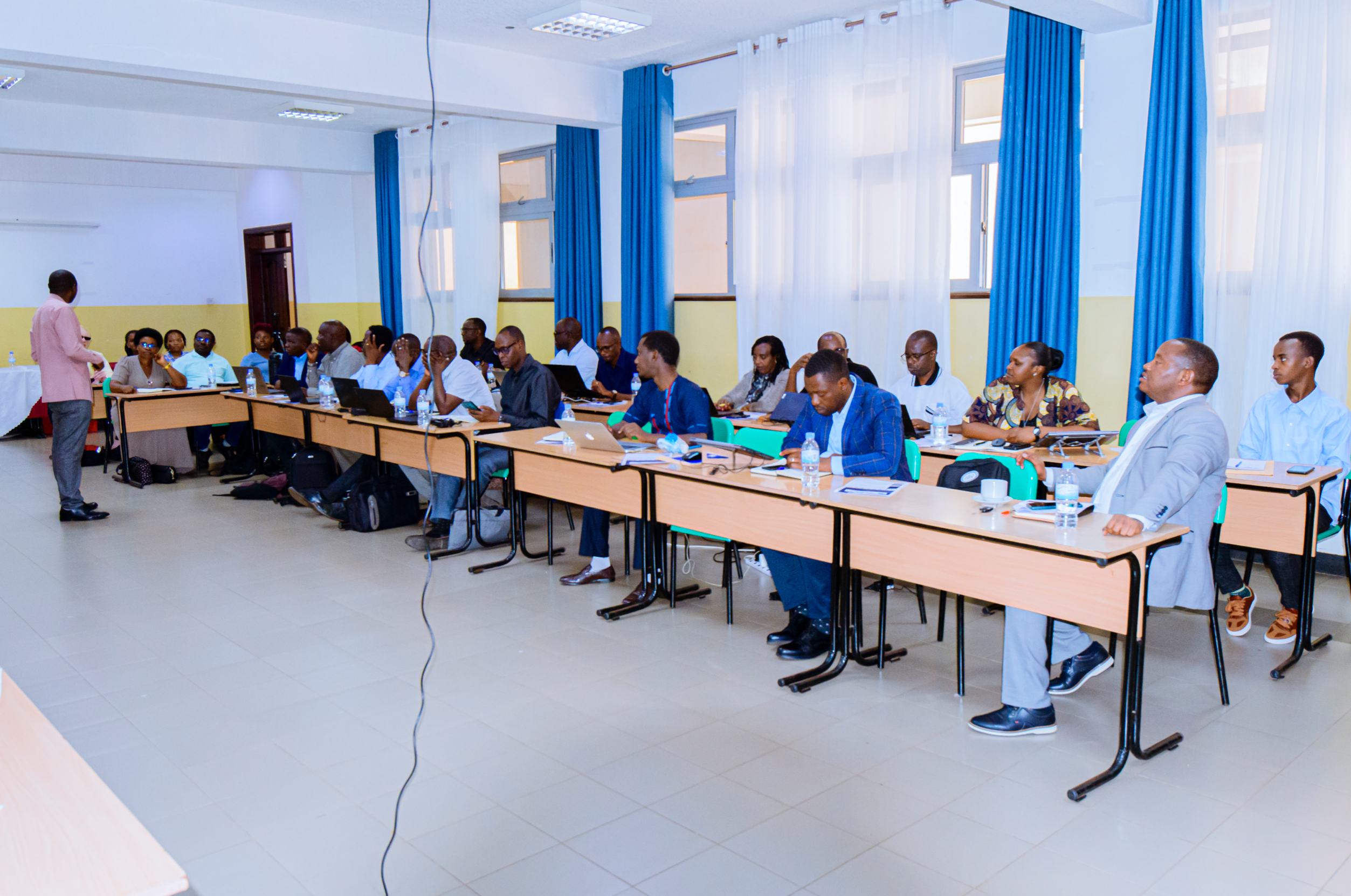 Facilitator Jean Bosco Nshimiyimana addressing participants+