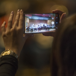 Girl filming during International Film Festival (iRODI) in Greece