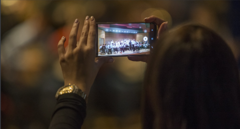 Girl filming during International Film Festival (iRODI) in Greece